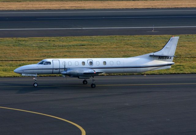Fairchild Dornier SA-227DC Metro (N159WA) - KPDX - Feb 26th, 2005 - Metro N159WA rolling to departure runway at Portland.