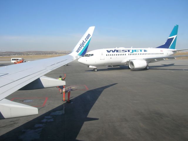 Boeing 737-700 (C-GWSP) - Westjet 737-700 approaching gate on arrival from Vancouver CYVR.