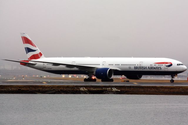 BOEING 777-300ER (G-STBK) - British Airways B777-300 arriving to a rainy/foggy Boston Logan looked to be a sub for usual B772/B787 on 3/19/22. 