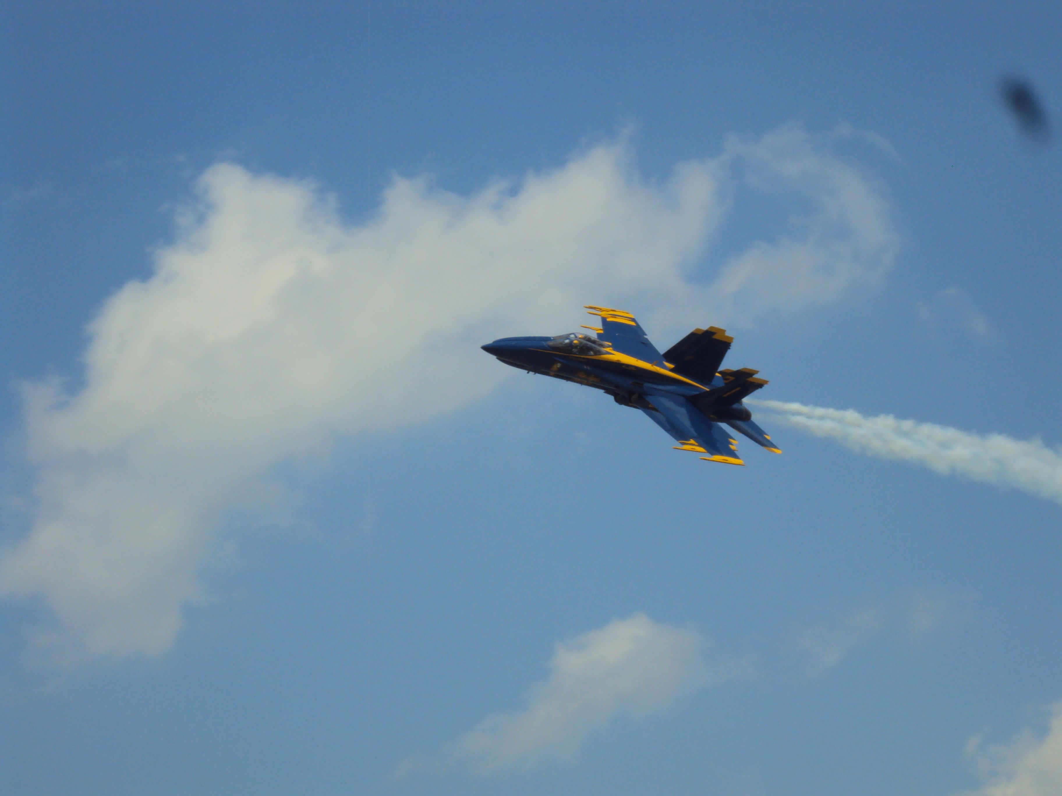 UNKNOWN — - 4 Blue Angels doing a Fly by in formation. Looks like 1 aircraft when I snapped the picture. Unedited.