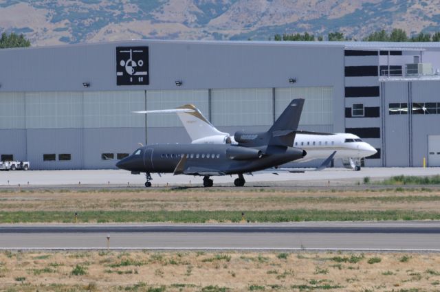 Dassault Falcon 900 — - Taxing for Runway 13 with Global 6000 (VP-CGL) in the background. br /Best viewed in full! 