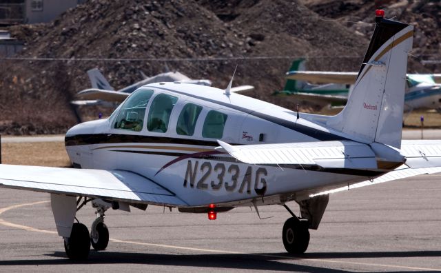 Beechcraft Bonanza (36) (N233AG) - Departure RW 26