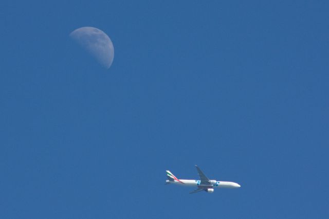 BOEING 777-300ER (A6-ECC) - Emirates B777-300 flies past the moon before turning and making final approach to Boston Logan on 3/21/21.
