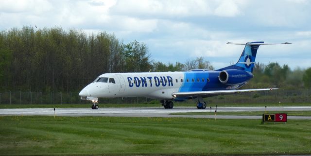 Embraer ERJ-135 (N812AE) - Taxiing to parking is this 2001 Contour Airlines Embraer 140LR in the Spring of 2024.