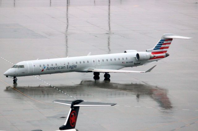 Canadair Regional Jet CRJ-900 (N616NN) - Taxiing to depart rwy 24R on 29-Jun-24 operating flight JIA5350 to KCLT.
