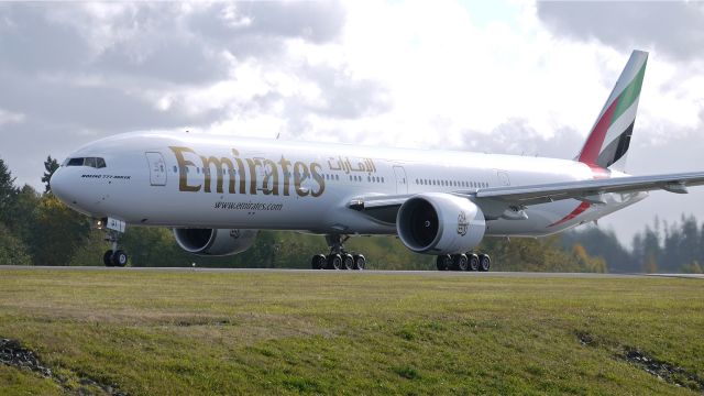 BOEING 777-300 (A6-EGI) - BOE867 begins a fast taxi test on runway 34L, 10/31/11. (LN:974 c/n 38986).