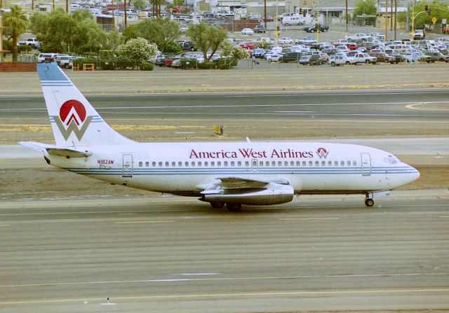 Boeing 737-200 (N182AW) - KPHX - America West 737-2 on taxi to the gate - photo date appr April 1997 - original delv to Ansett Australia Oct 1981. taken up by America West in Nov 1986. CN: 22649 LN: 801. I took this from the middle parking structure.