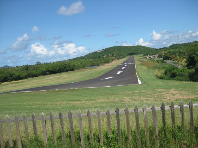 — — - Mustique Island St. Vincent & Greanadines