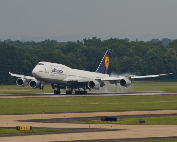 BOEING 747-8 (D-ABYA) - Lufthansa's brand new Boeing 747-8 arriving Dulles on its first revenue flight, June 1, 2012.