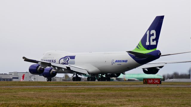 BOEING 747-8 (N770BA) - BOE573 during its takeoff roll on Rwy 34L on 2/4/14. (LN:1437 cn 37564).