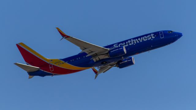 Boeing 737-800 (N8643A) - Southwest Airlines 737-800 taking off from PHX on the morning of 6/14/2022. Taken with a Canon 850D and Canon 75-300mm lens.