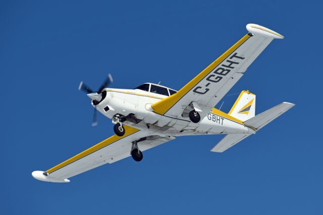 Piper PA-24 Comanche (C-GBHT) - 1959 Piper PA-24-250 Comanche (C-GBHT/24-1385) on final for runway 27 from Smiths Falls/Montague Airport (CYSH) on Jan 31, 2022