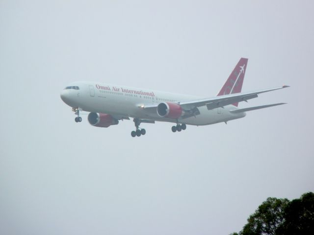 BOEING 767-300 (N378AX) - Coming in out of the gloom...