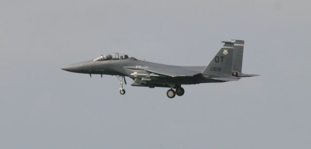 McDonnell Douglas F-15 Eagle — - F-15 Eagle. I was driving north out of Destin passing Eglin AFB where they had numerous jets performing touch and gos. I pulled over and took photos of this impromptu airshow.