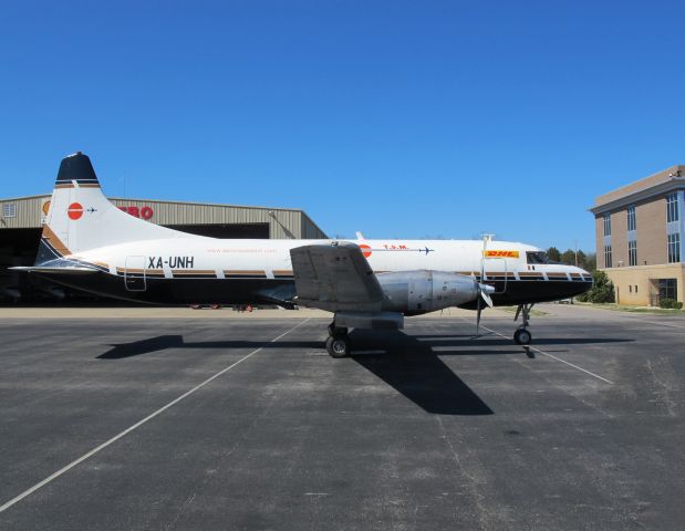 CONVAIR CV-580 (XA-UNH) - Freight for the Nissan car plant.