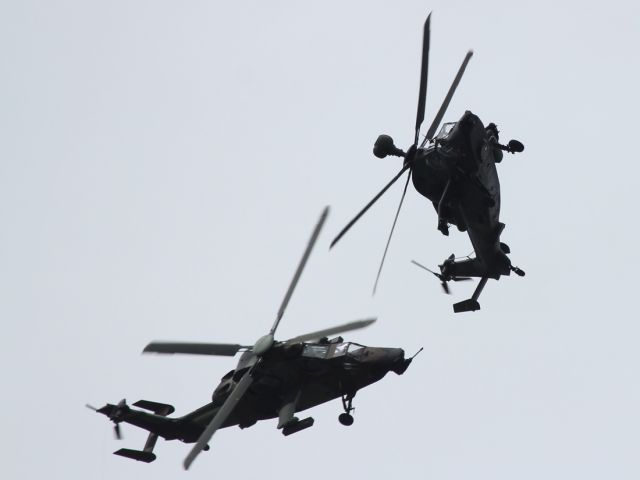 — — - Two Tigre Helicopter Gunships engage in a mock dog fight at PAS 2013.