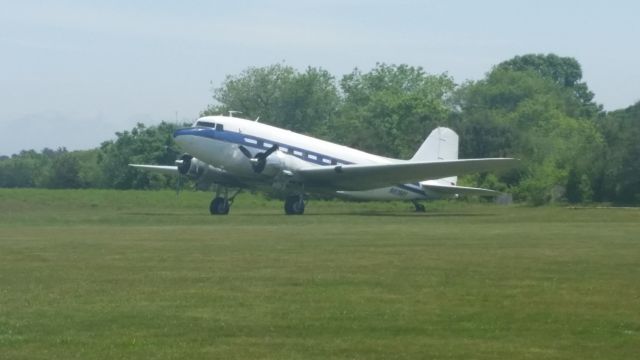 Douglas DC-3 (N61981) - DC3 on the grass at Cape Cod Airfield