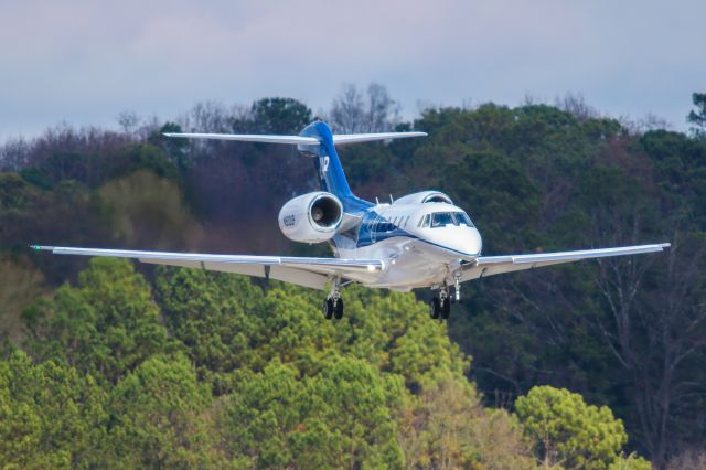 Cessna Citation X (N900UP) - This is a photo of N900UP, a 2000 Cessna 750 on final for Atlanta's PDK executive airport. I shot this with my Canon 800mm lens. The camera settings were 1/2000 shutter, F5.6 ISO 400. I really appreciate POSITIVE VOTES & POSITIVE COMMENTS. Please check out my other aircraft photography. Questions about this photo can be sent to Info@FlewShots.com