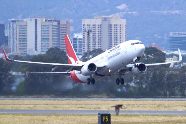 Boeing 737-800 (VH-VXN) - Getting airborne off runway 23. Friday 1st February 2013.