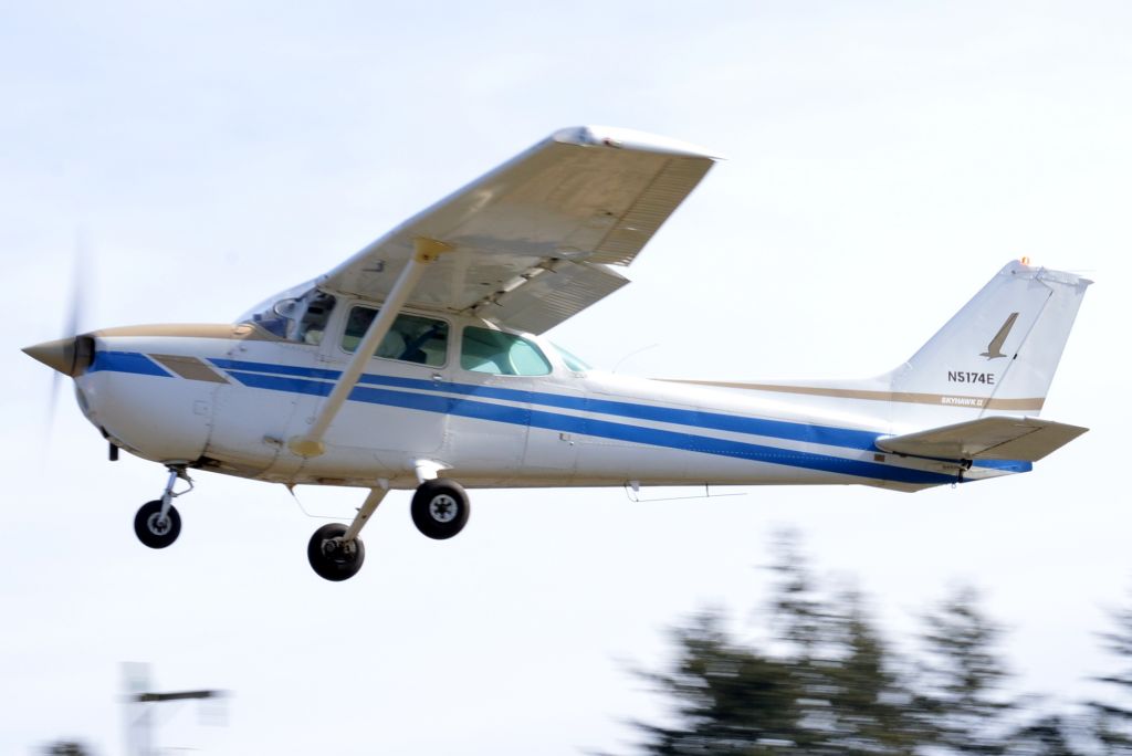 Cessna Skyhawk (N5174E) - Just airborne after departing off of Runway 32. My uncle at the flight controls!