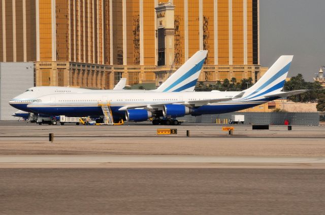 Airbus A340-500 (VP-BMS) - Sister ship Boeing 747SP VP-BLK in the background.