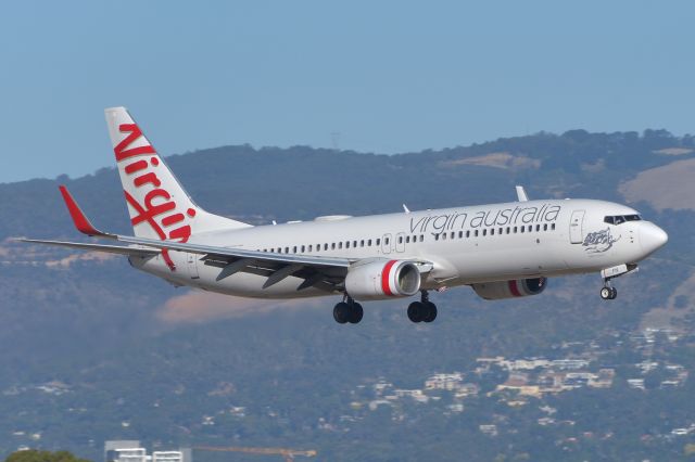 Boeing 737-800 (VH-YFN) - Feb 5, 2020, 1824 hrs. About to land runway 23, taken from inside the terminal.