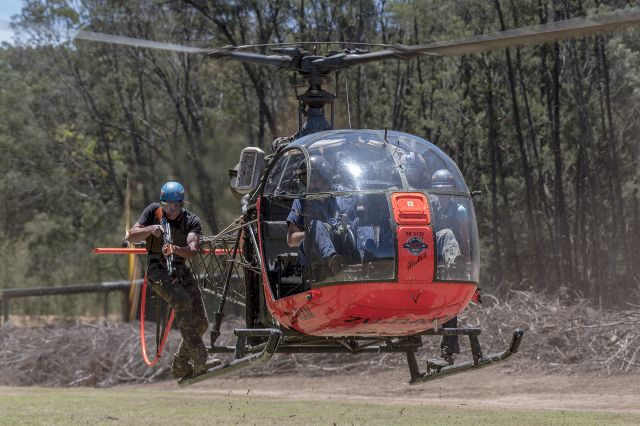 SUD-EST SE-3130 Alouette 2 (ZU-RAM) - Skid-on and live fire exercise at a local shooting range.