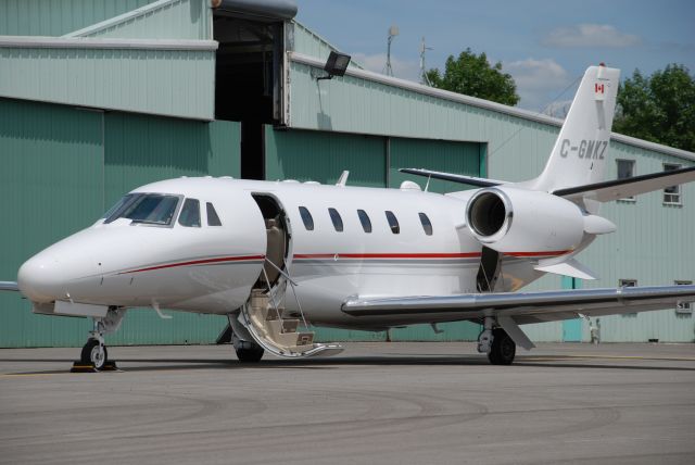 Cessna Citation V (C-GMKZ) - Magna Internationals Citation 560XL, inside the hangar is their Falcon 900! Photo taken at Buttonville Airport (Toronto) July 4/08.