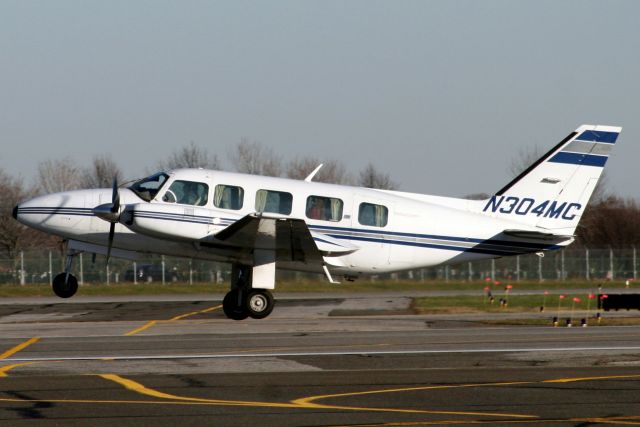 Piper Navajo (N304MC) - Airborne off rwy 1 on 24-Nov-06.  Reregistered N827RD 3-Mar-07.