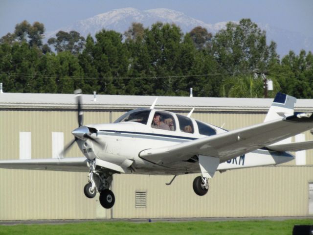 Beechcraft Bonanza (33) (N913KM) - Taking off RWY 24