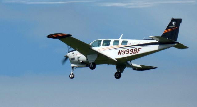 Beechcraft Bonanza (36) Turbo (N999BF) - On short final is this 1979 Beech A36TC Bonanza in the Summer of 2022.