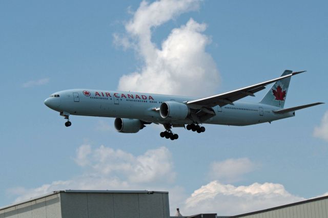 BOEING 777-300ER (C-FIUW) - Arriving mid-afternoon on 24R