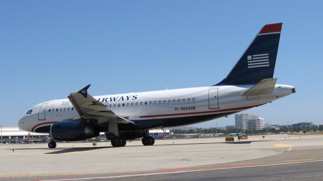 Airbus A319 (N834AW) - Holding short of RWY 19R