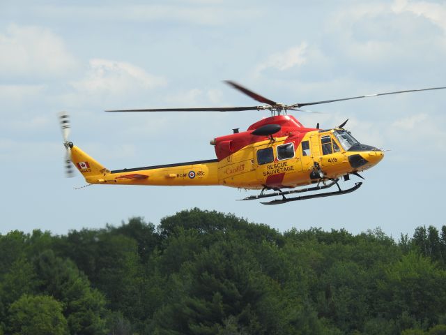 — — - Rescue team arrival at CYQA with survivers of boat mishap.