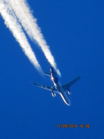 Boeing MD-11 (N594FE) - FedEx flight 582 from MEM to PDX over Baxter Springs Kansas (78KS) at 36,000 feet.