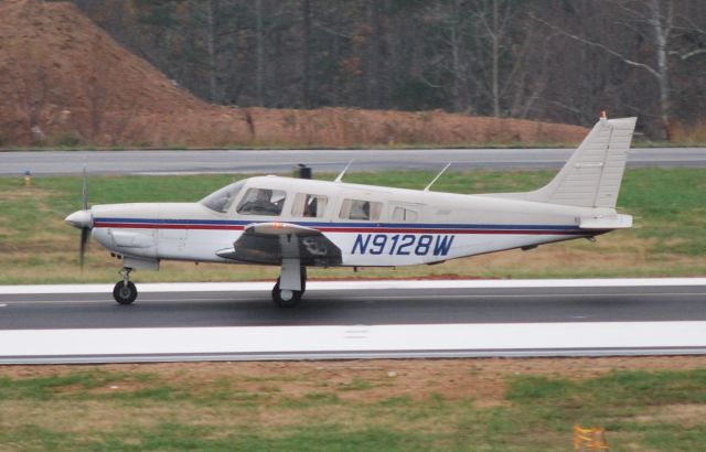 — — - Rolling down runway 20 at Concord Regional Airport (KJQF) - 11/19/09