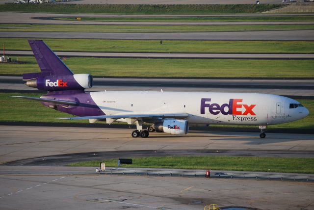 McDonnell Douglas DC-10 (N559FE) - Taxiing out at dawn 6/16/12