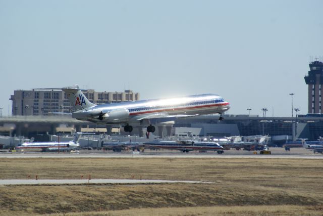 McDonnell Douglas MD-80 — - American Airlines MD80 landing. Caught the shot as soon as the sun reflected off of the plane.