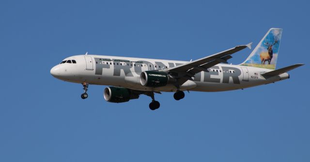 Airbus A320 (N213FR) - On final is this 2011 Frontier Airlines Airbus A320-214 in the Winter of 2020. Montana the Elk prowls the tail.