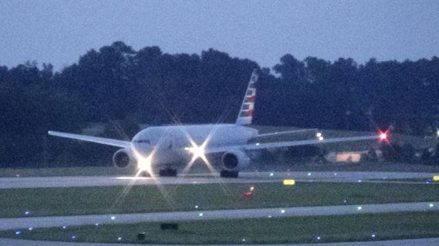 Boeing 777-200 (N755AN) - American 174 departing to London LHR at 8:42 P.M.  Taken June 7, 2015.  