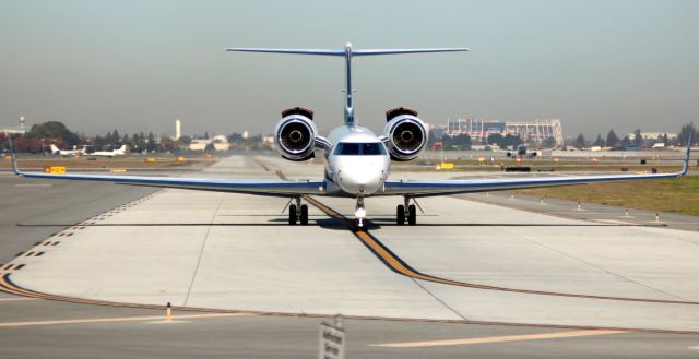 Gulfstream Aerospace Gulfstream V (N10XG) - Taxiing for departure, 30L, Levi Stadium on right side of aircraft