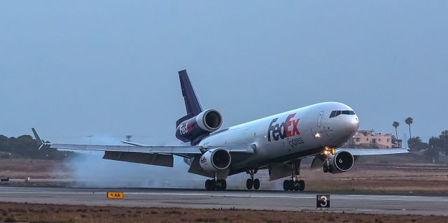 Boeing MD-11 (N591FE) - Morning arrival on runway 6R LAX, Los Angeles, California USA