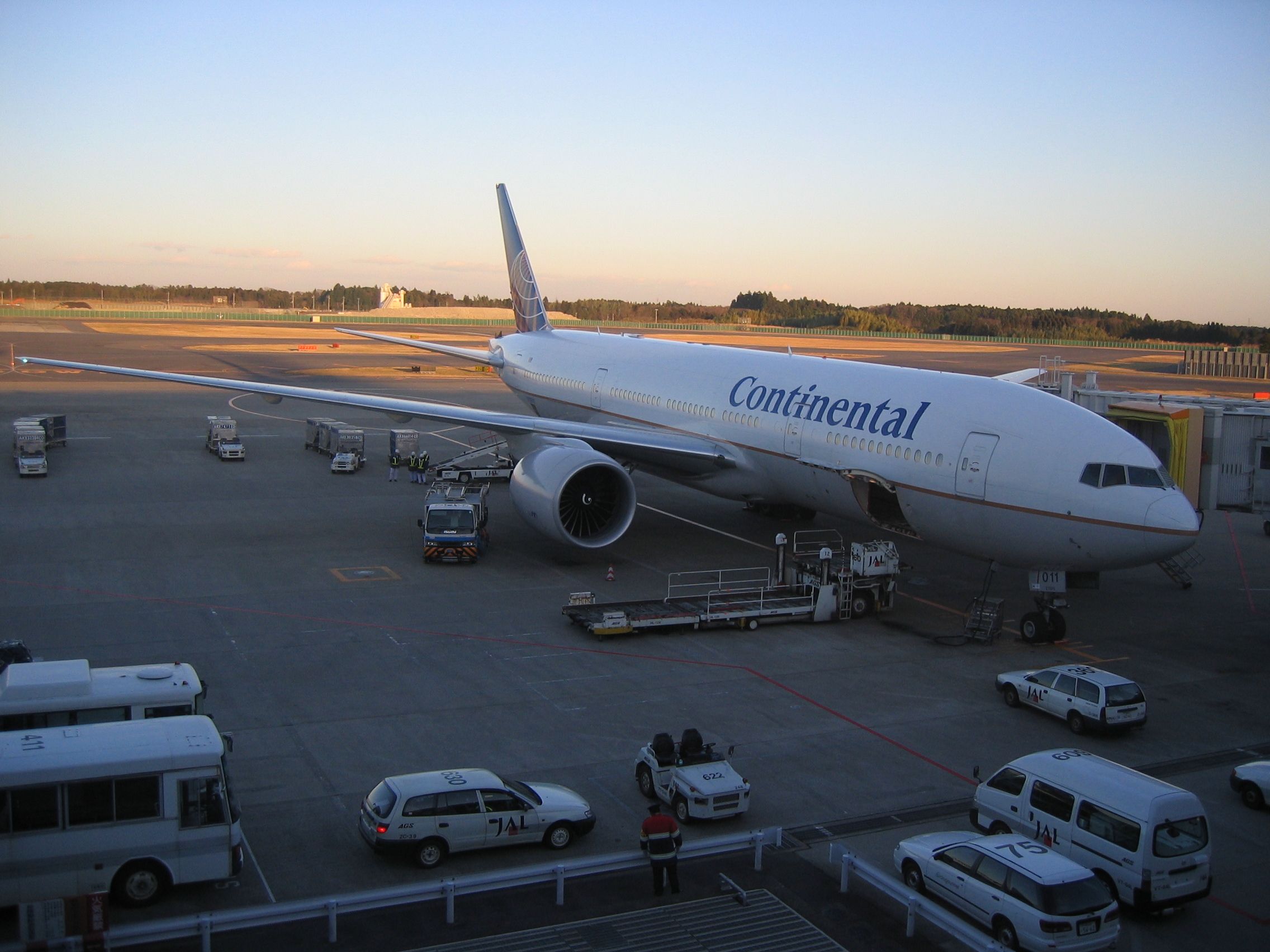 Boeing 777-200 (N79011) - Parked at the gate prior to flying back home.