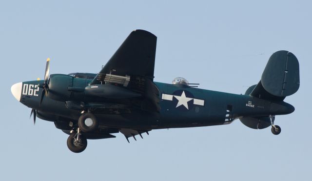 N6657D — - N6657D, a Lockheed PV-2 Harpoon, is caught here as it arrives at Reno Stead Airport on the evening prior to the start of the 2014 National Championship Air Races.  After landing on runway 26, N6657D was positioned in the static display area for viewing by the attendees during the final weekend of the event. br /Tickets for this years 2015 Reno Air Race event went on sale last week.  Six months to go and counting down!  