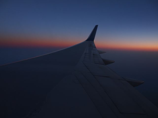 — — - Wing at dusk