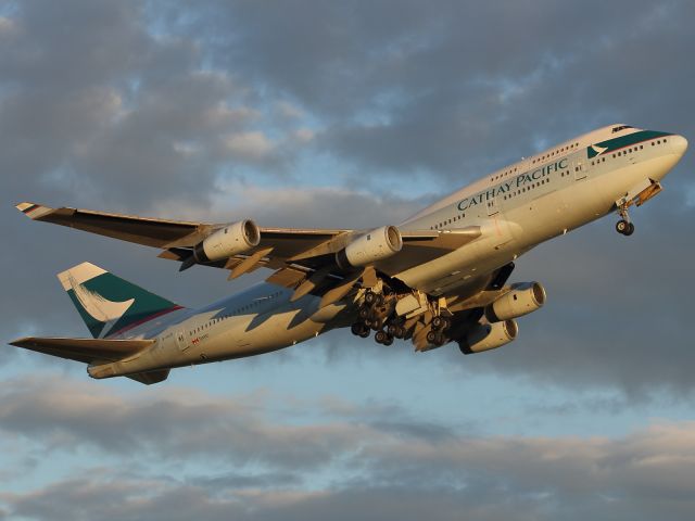 Boeing 747-200 — - Departing runway 027R at LHR, Far East bound.