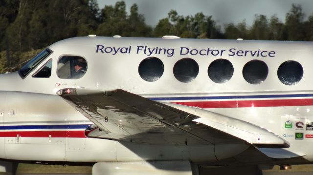 Beechcraft Super King Air 200 (VH-FDB) - RFDS aircraft landing at Brisbane Airport