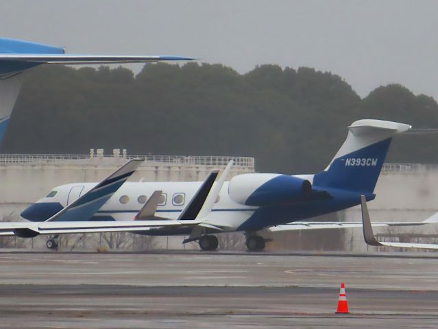 GULFSTREAM AEROSPACE G-7 Gulfstream G600 (N393CW) - Photo taken on Feb 21, 2024.br /N393CW from NRT to HKG via CTS, taxiing to the end of the runway for takeoff, but was buried by many Biz winglets parked in the spot in front of it.br /The air was yellowish and stagnant due to yellow dust from mainland China on that day.