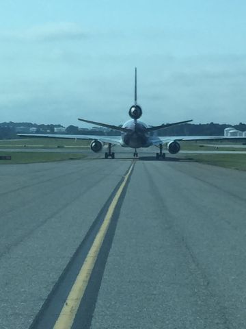 Beechcraft 55 Baron (N777WW) - Waiting in line to take home the new Baron from KGSO