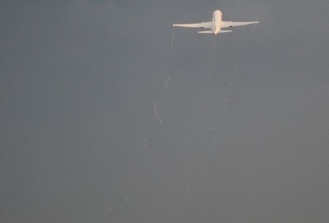 BOEING 767-200 (N249AU) - Departing 18C into passing storms with rain and sun at the same time - 5/27/11